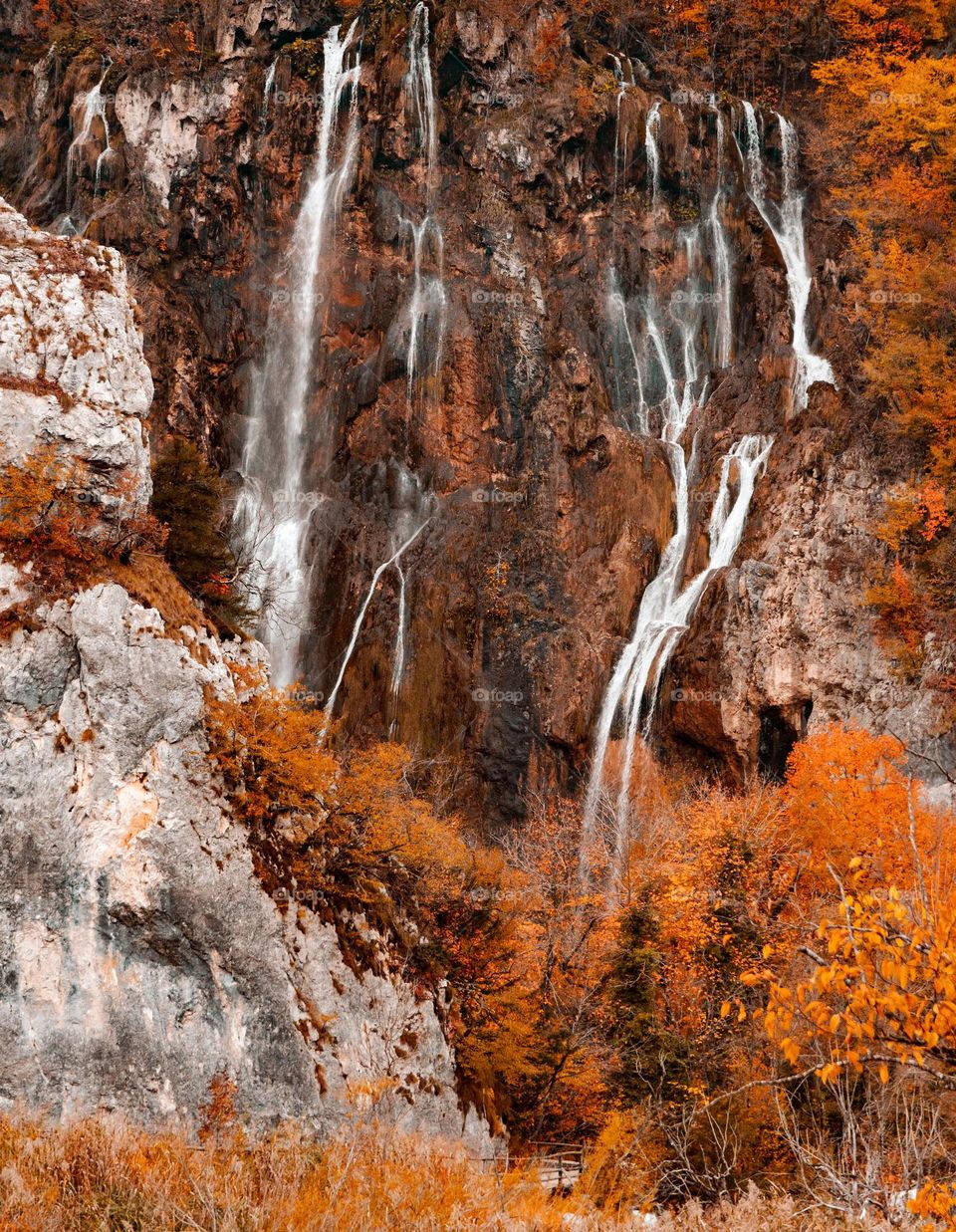 Beautiful autumn scenery with waterfalls at Plitvice lakes national park in Croatia