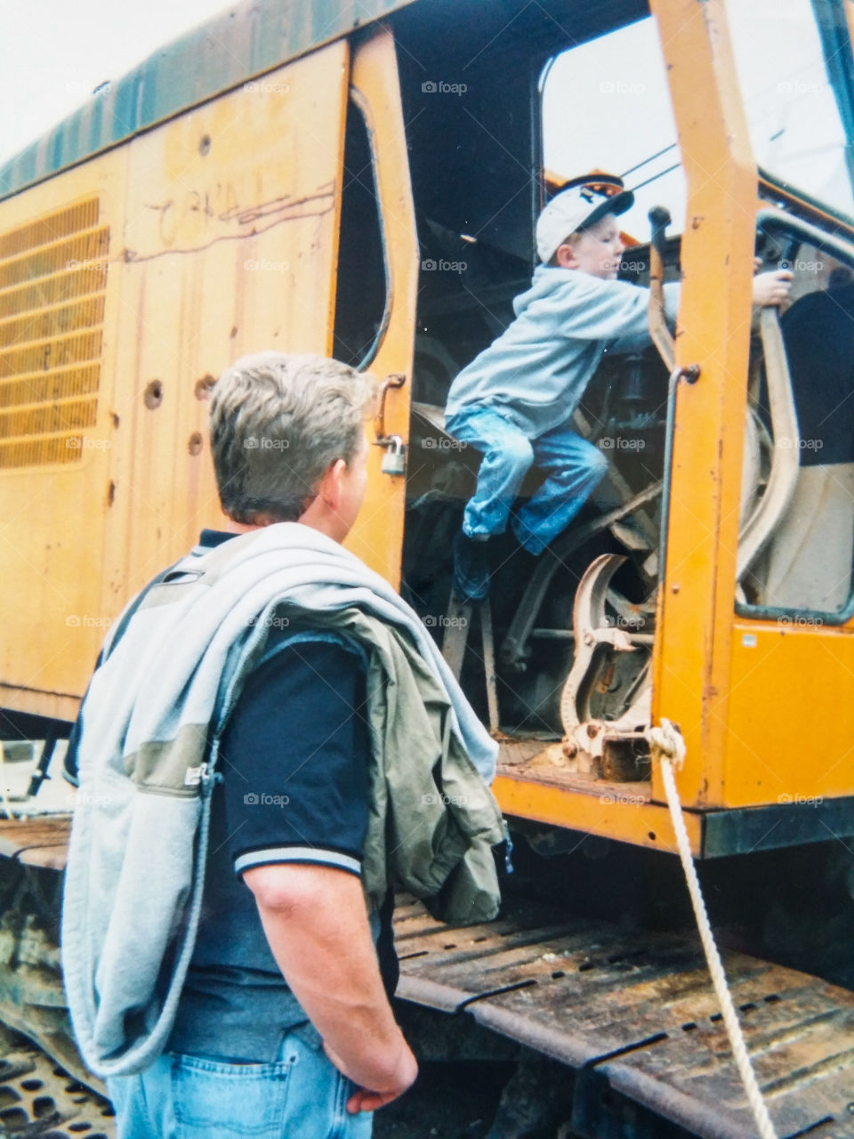 Boy driving excavator