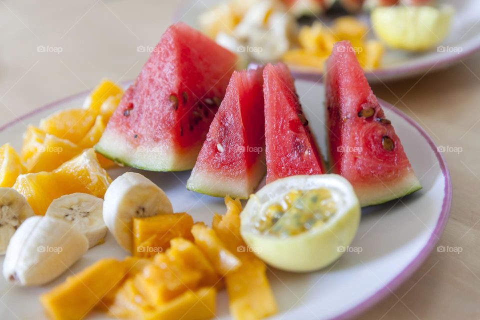 Summer fruits on a plate, perfect breakfast option