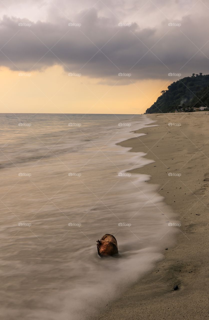 Chasing Sunset at the Beach with the waves as the leading lines.