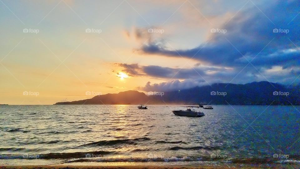 environment sunshine reflection peaceful day island air calm coast abstract tropical vacation golden panoramic tree season tranquil atmosphere tourism scenery seascape cloudy paradise natural panorama weather heaven clouds cloudscape bright scene col