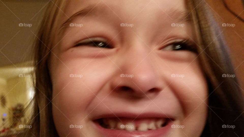 Smile. Close up of young girl smiling. 