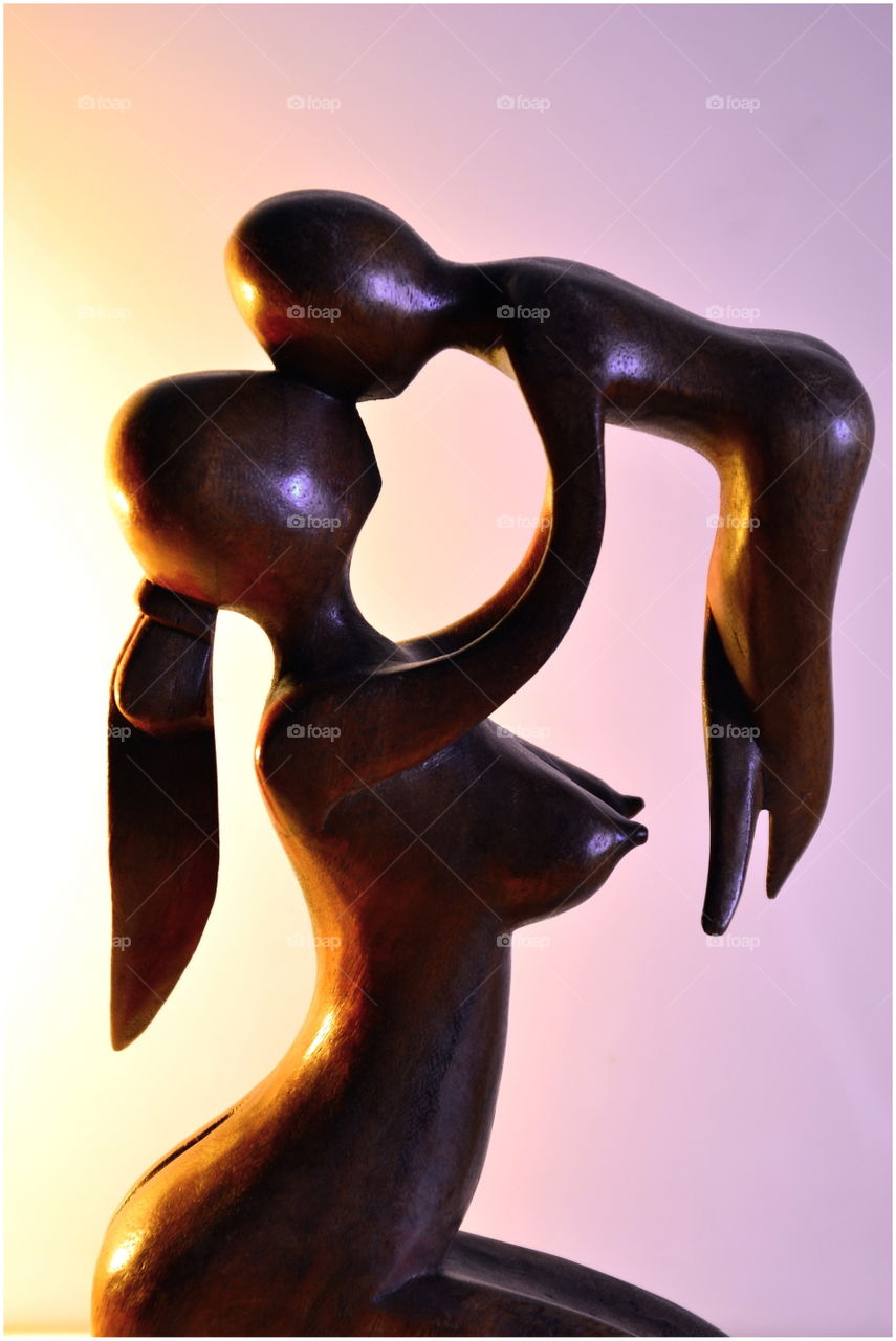 wooden sculpture, woman with child