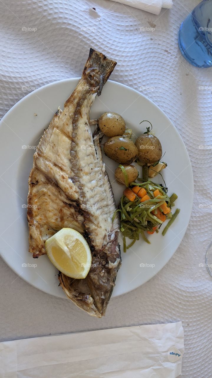 fish with potatoes and warm vegetables
