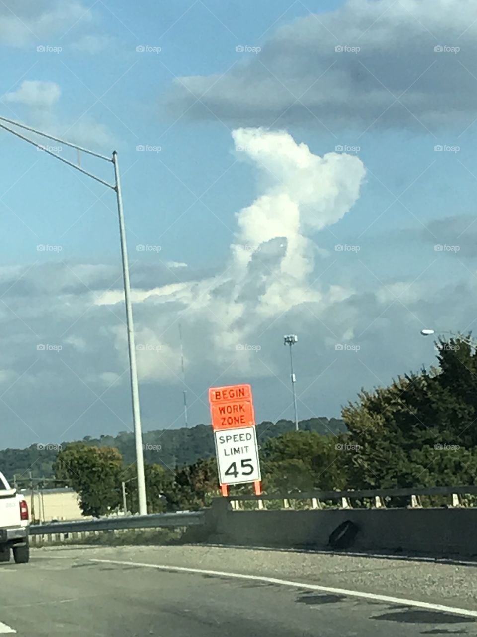Snoopy and his doghouse clouds