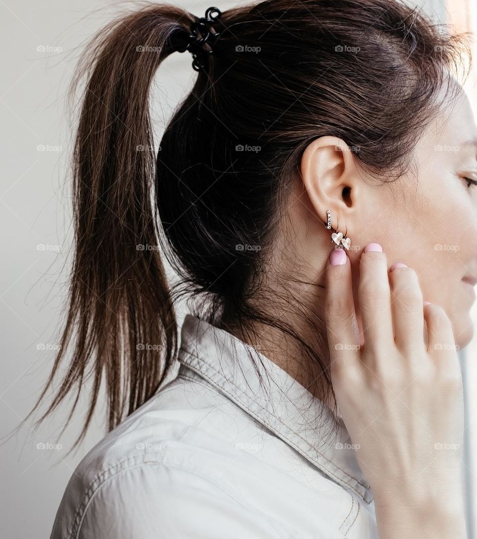 portrait of woman with earrings