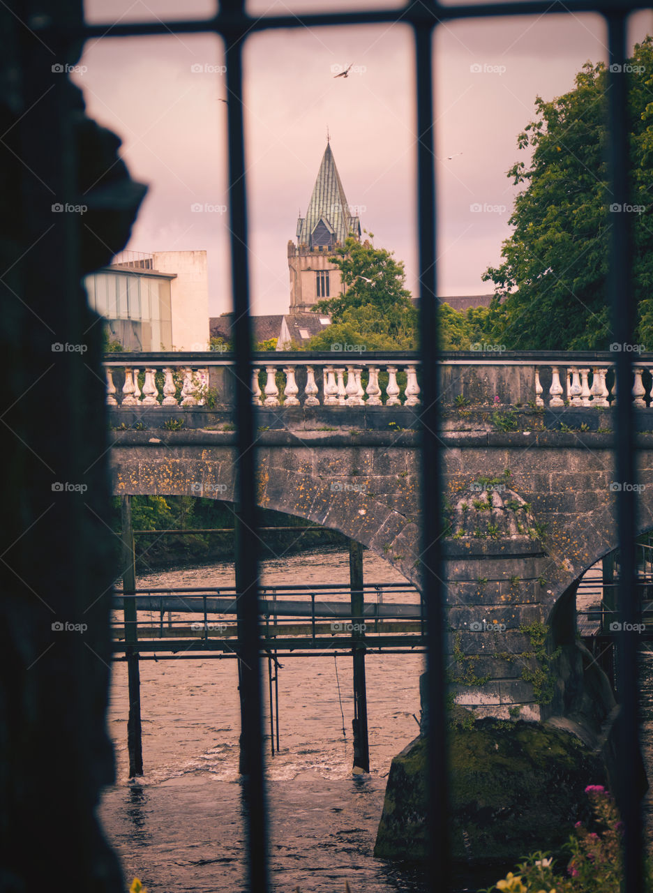 Window view on bridge over Corrib river at Galway City in Ireland