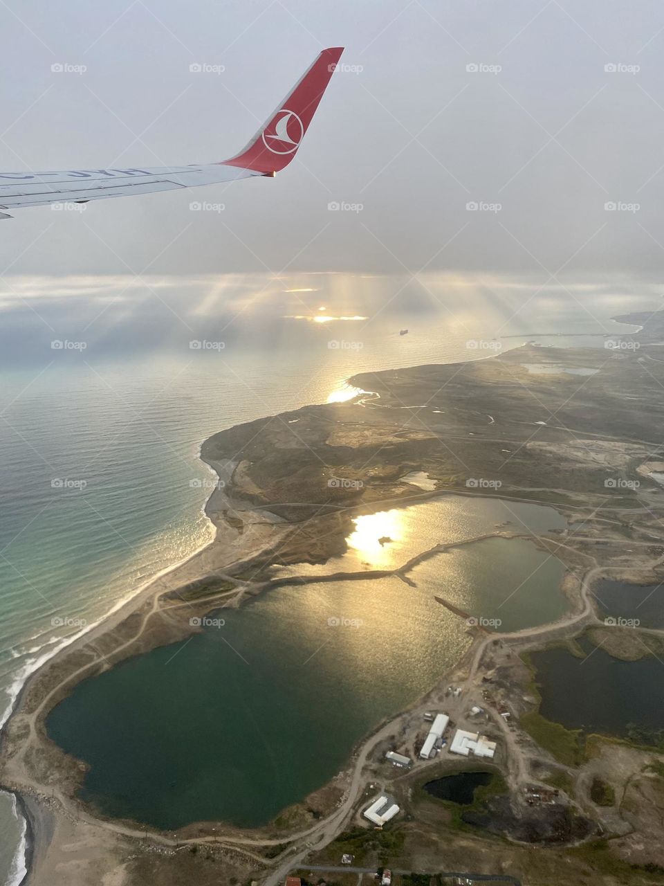 The sun rays are piercing above the Marmara see, giving cozy yet beautiful morning image of the landscape. 