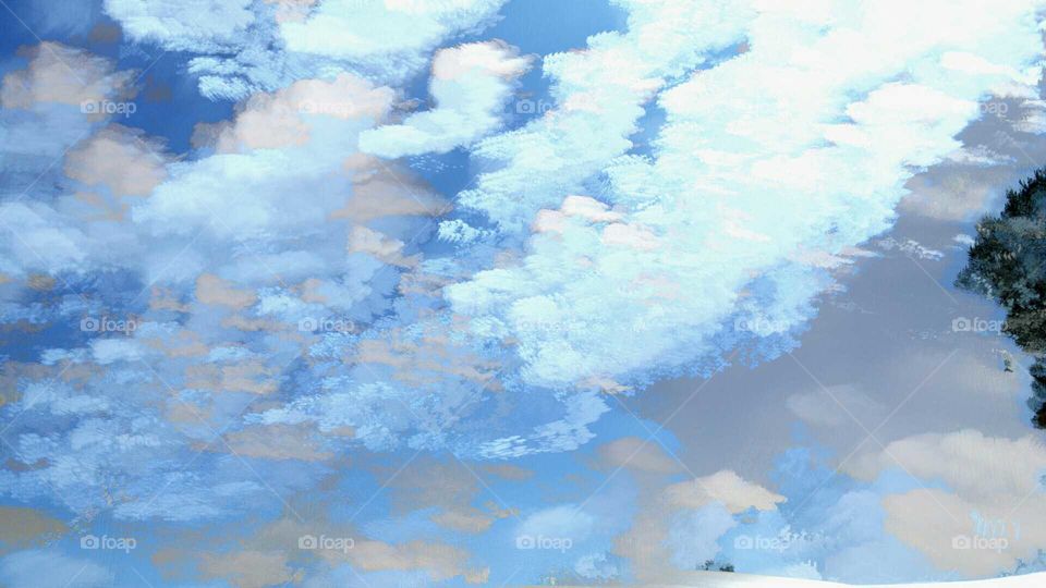 Clouds in a Deep Blue Sky  (Long Exposure)