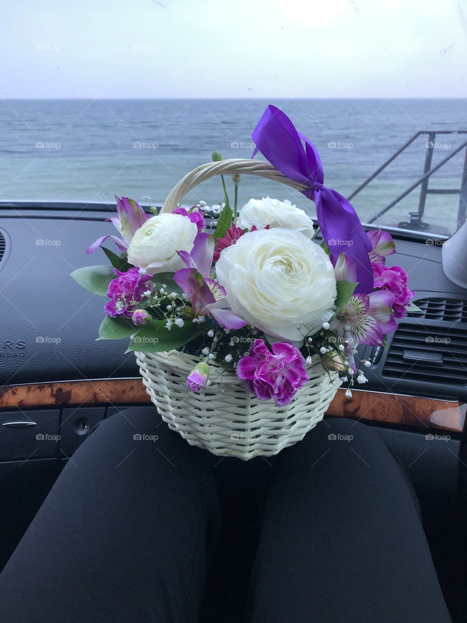 Sea and basket of flowers 