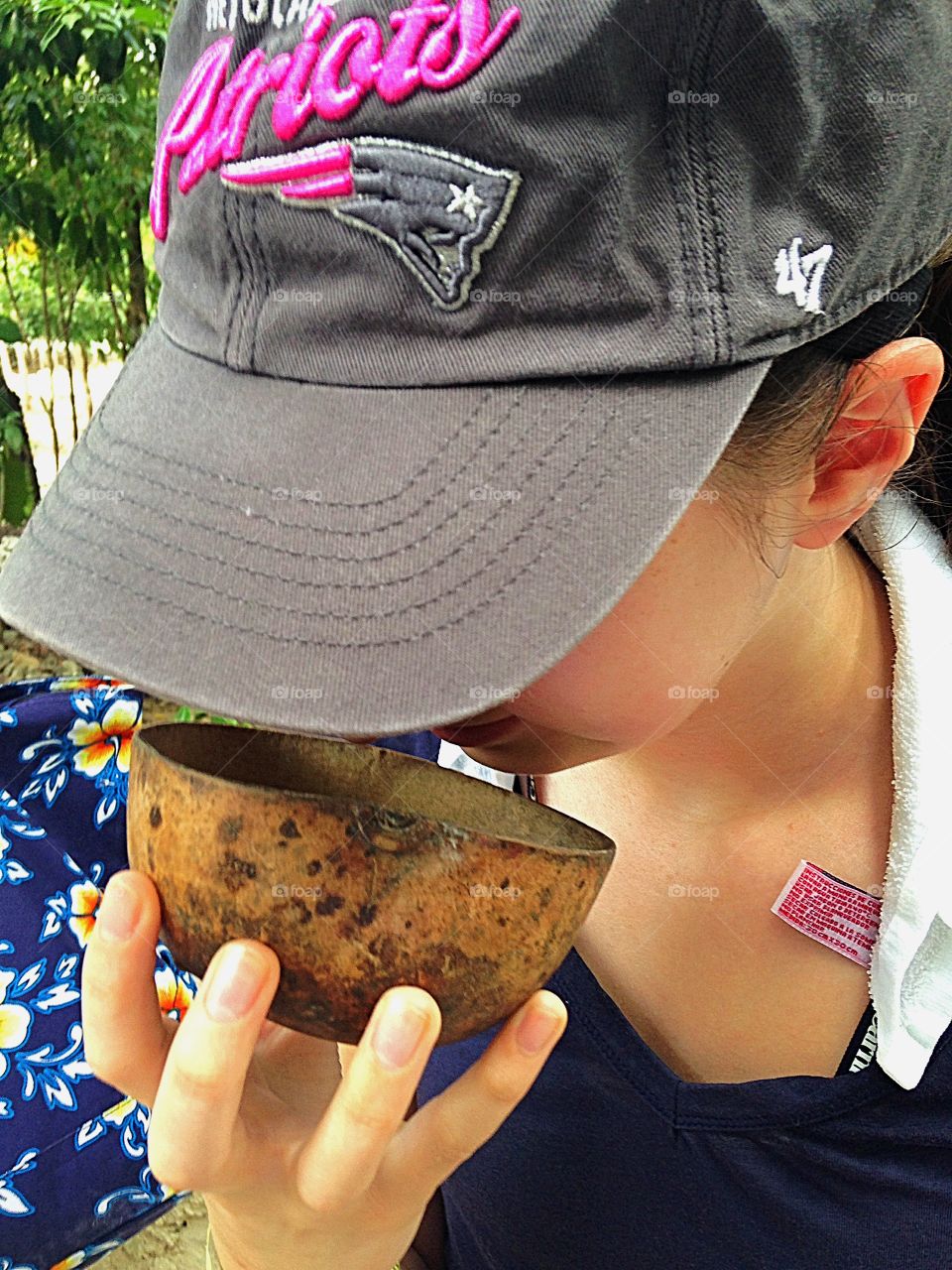 Taking a sniff of the cacao beans - they don't smell very good! 