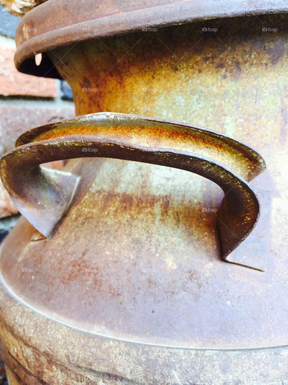 Closeup of an antique milk can