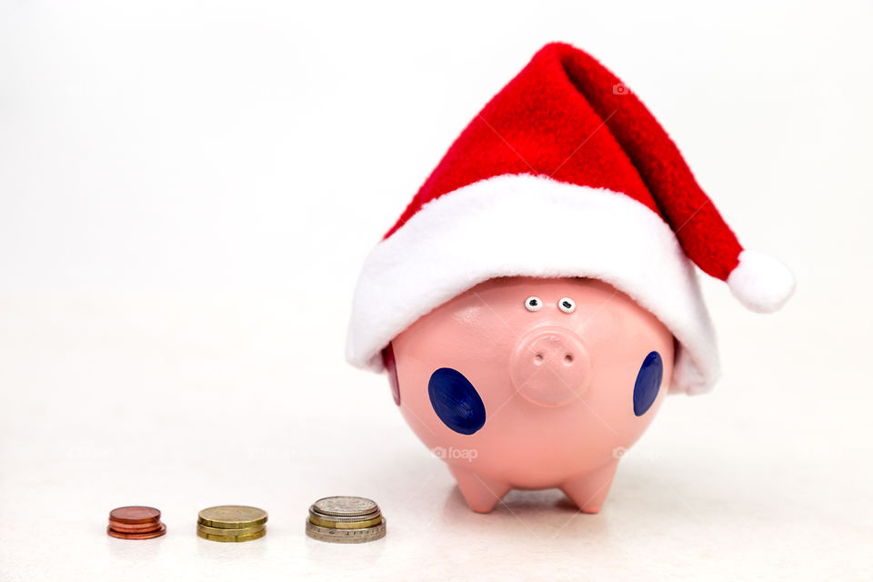 piggy bank in Santa cap