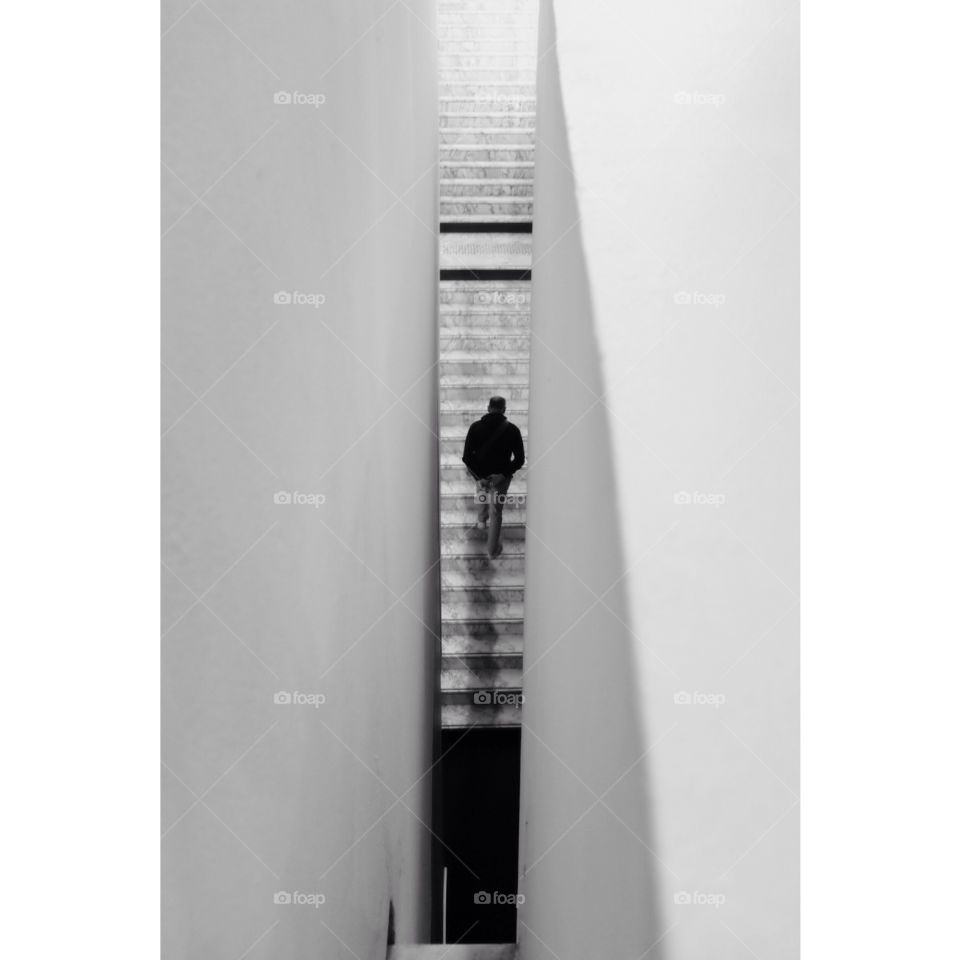 Stairs. A man climbing stairs     