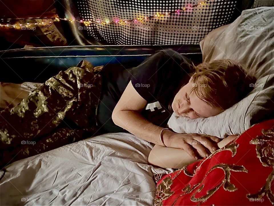 Slumbering peacefully aboard our home on the sea, the “Salvation” as it peacefully rocks along to promote healthy deep REM dream sleep is Timothy, my partner in life to demonstrate what I just wrote about. 2023. Hypnotic Productions