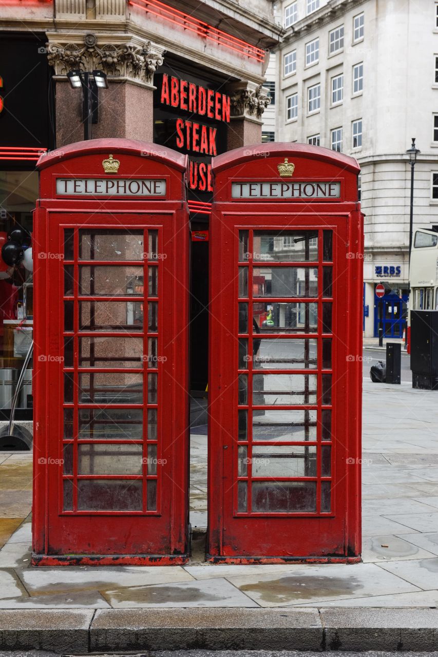 Red telephone booth near Piccadilly Circus in London.