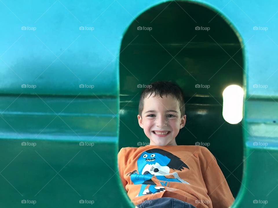 Happy Boy At Playground 