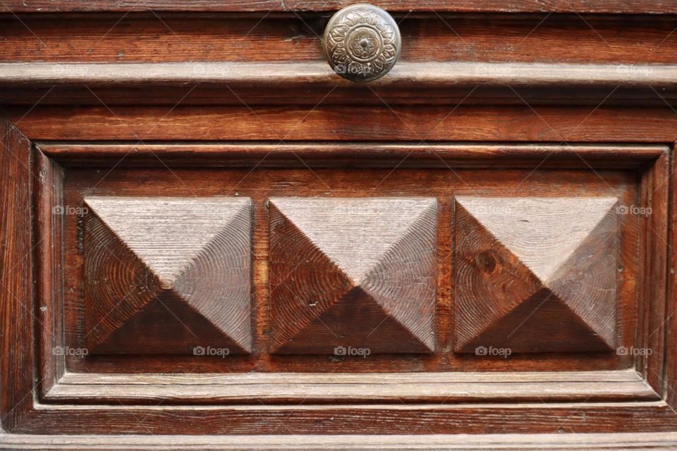 Triangles on wooden door