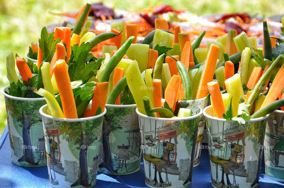 summer salads with carrots and peppers on the table