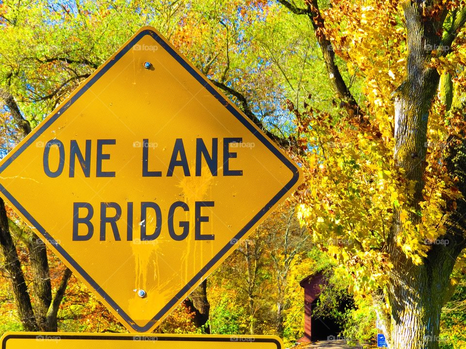 One lane bridge sign board