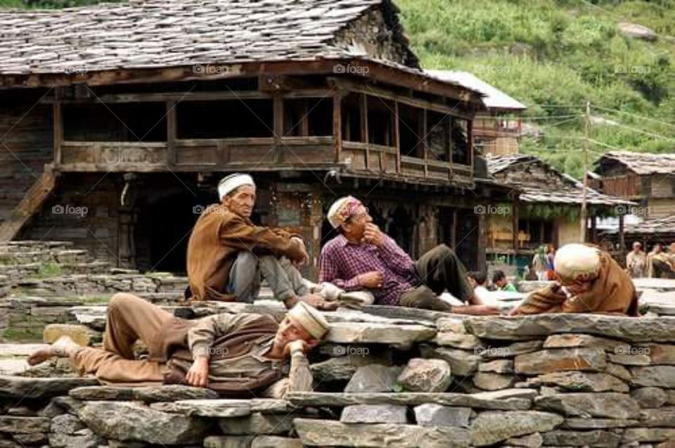 Peaceful place ..... people are taking rest outside of their hose and chilling.... This is upper himachal kullu valley