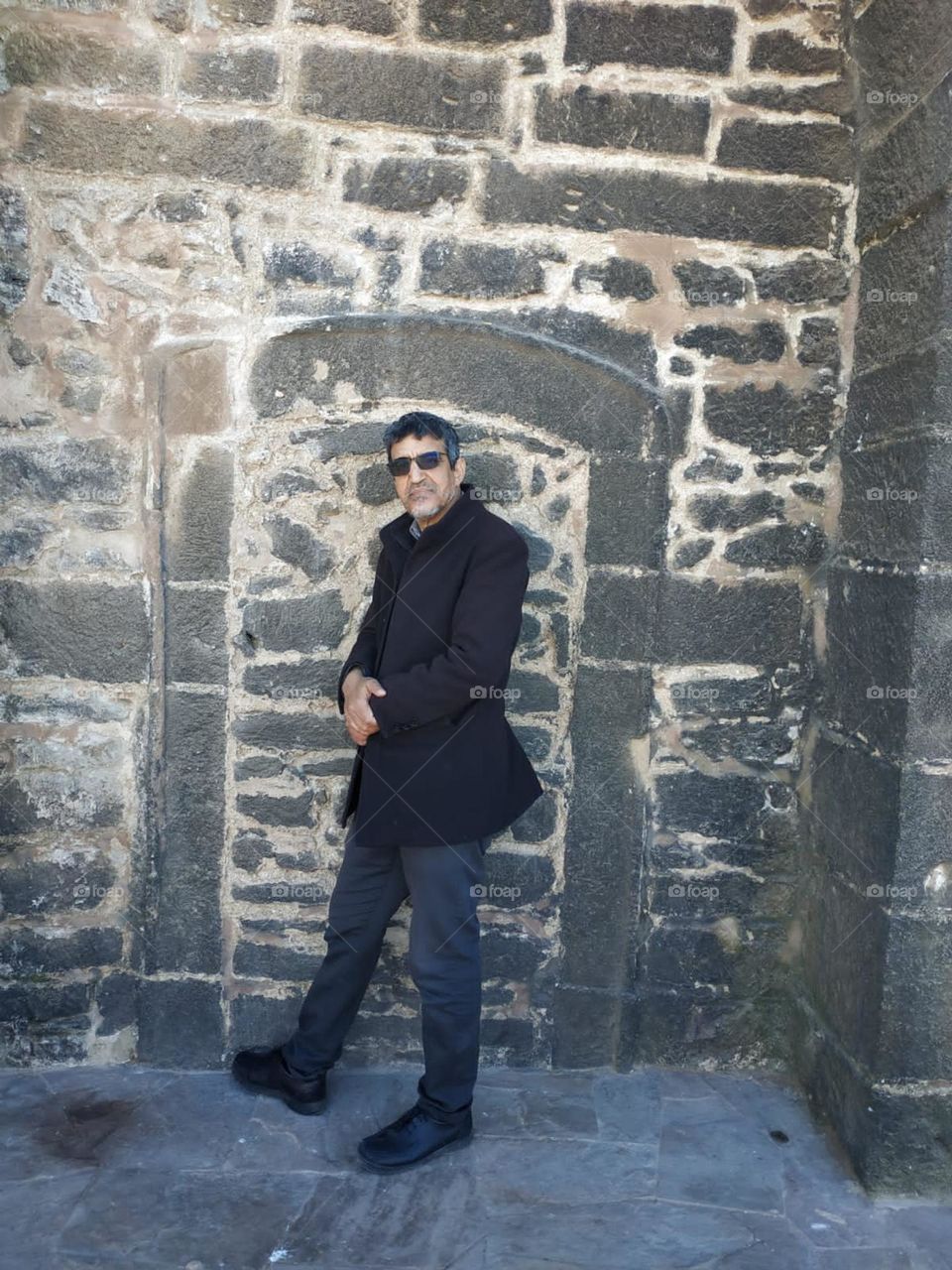 Im standing near an ancient wall at essaouira city in Morocco.