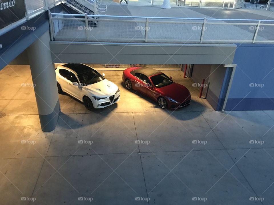 Birds eye of fancy cars in garage