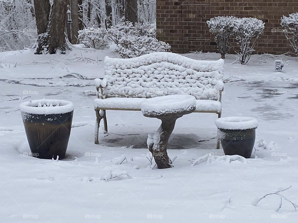 Bench under snow