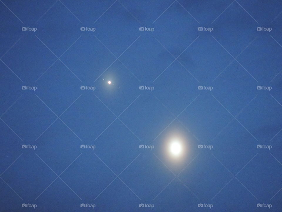 Venus and Jupiter. Best shot of the biggest planetary conjunction in 100 generations, with the big 4 moons visible!