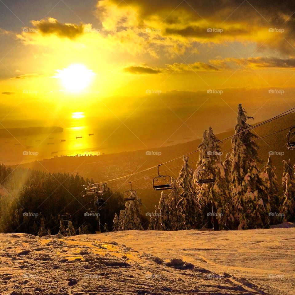 Sunset views from Grouse Mountain's Peak ski run.