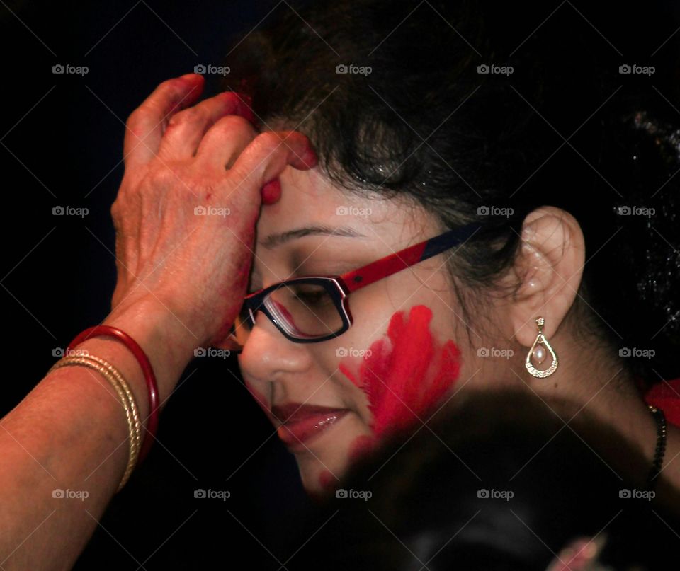 Indian woman celebrating holi