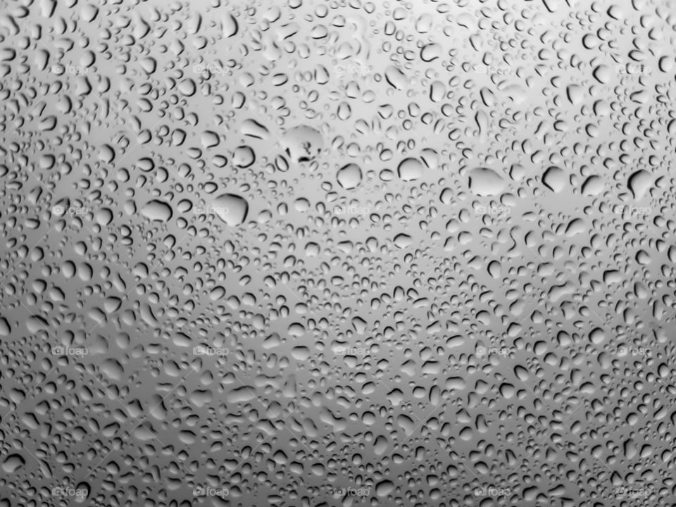 water droplets on a smooth glass window