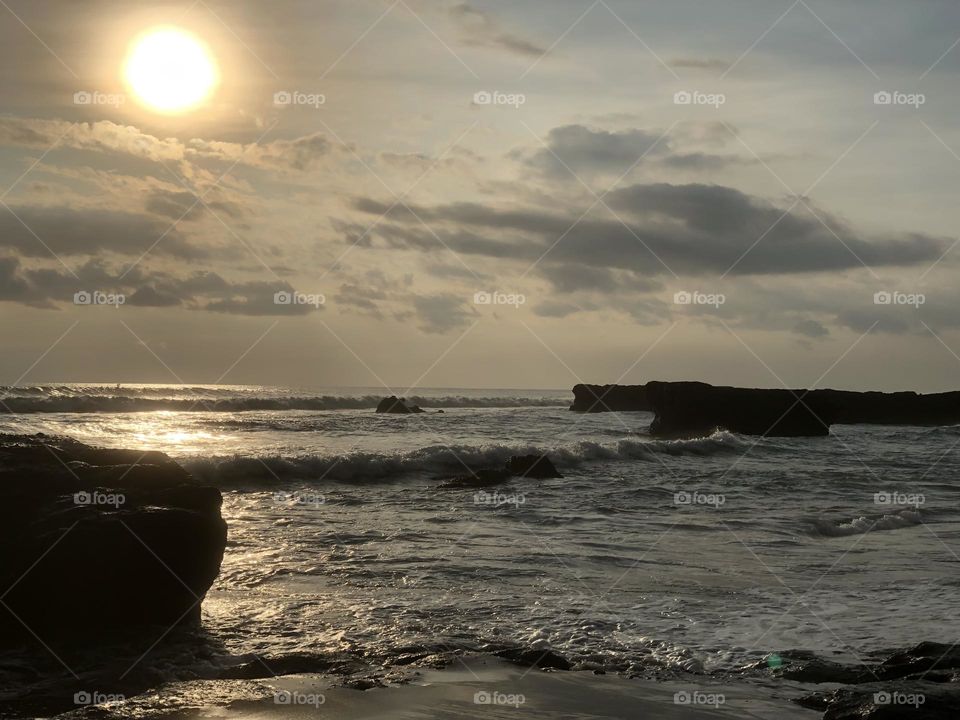Gold sunset on the nice beach