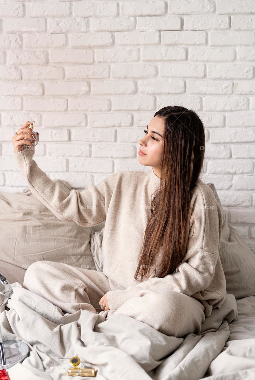 woman using cosmetics