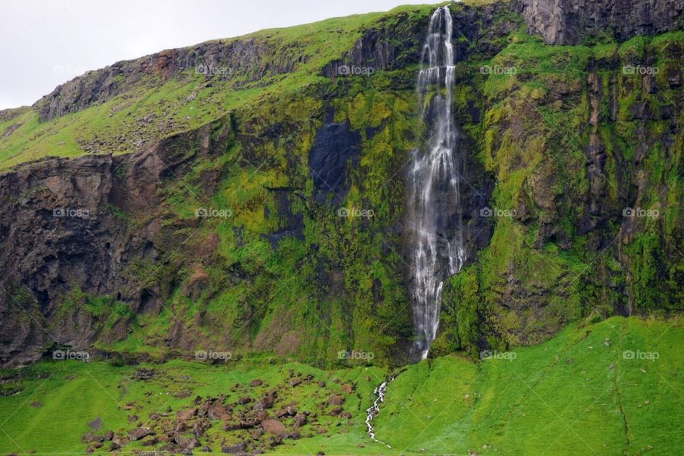 Iceland. Driving along the ring road with gorgeous waterfalls lining it