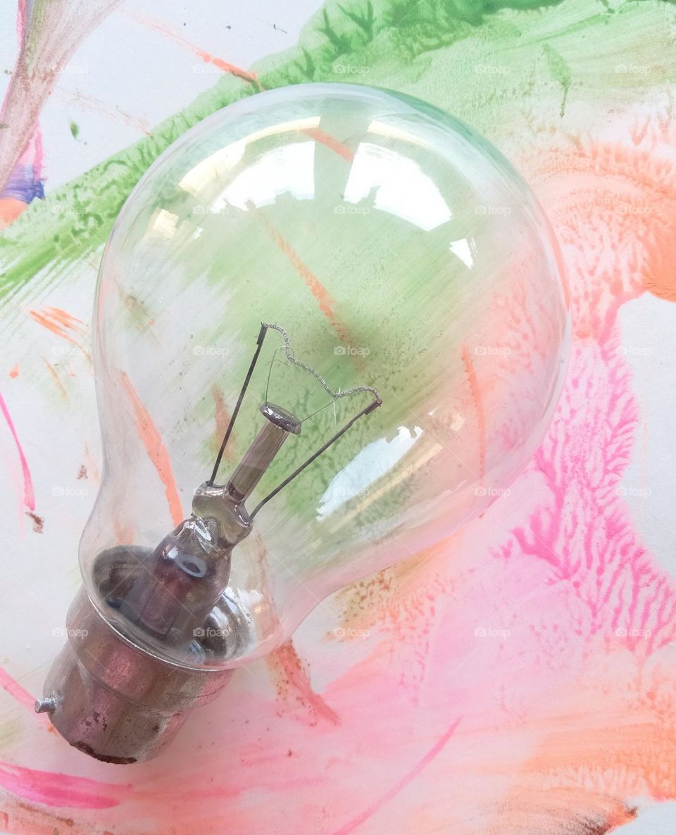 Circular thing : electric 💡 with power of 100 watt