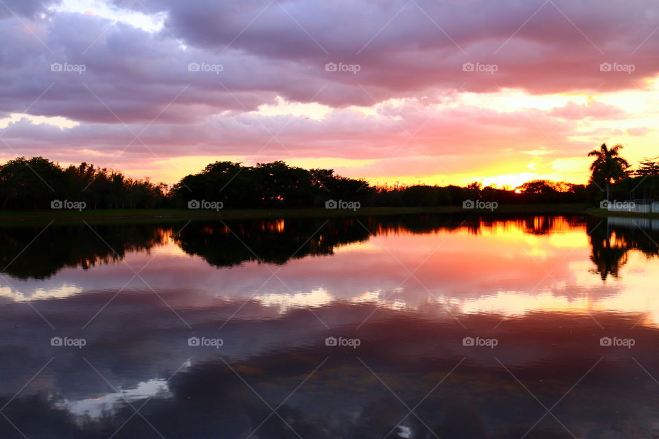 Reflection of clouds with dramatic sky