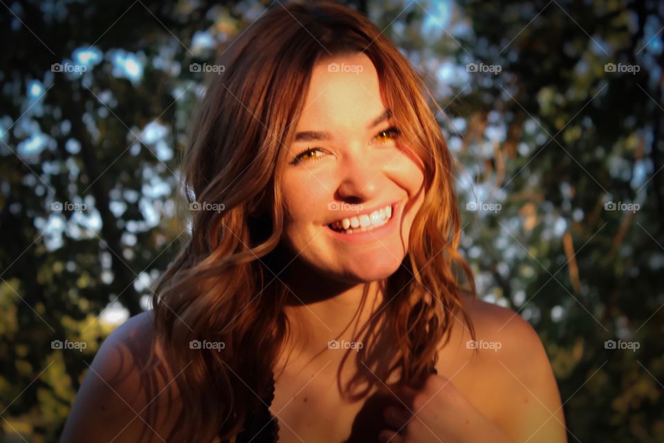The most beautiful smile, in a warm summer sunset