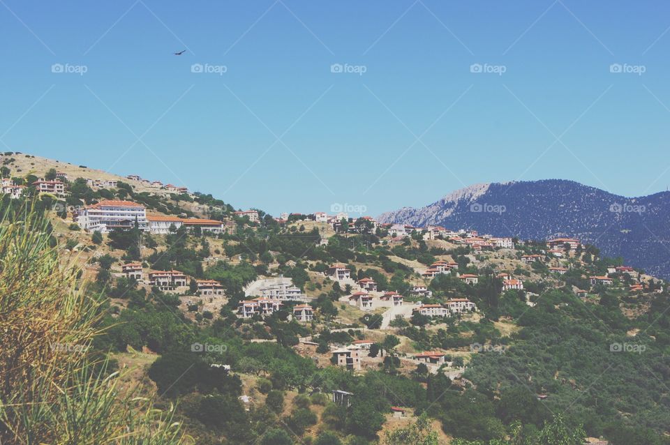 Greek buildings on the side of a hill