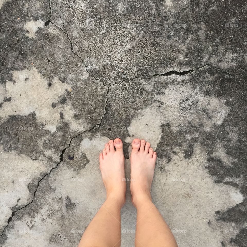 Selfie of woman bare feet. Selfie of woman bare feet on floor.
