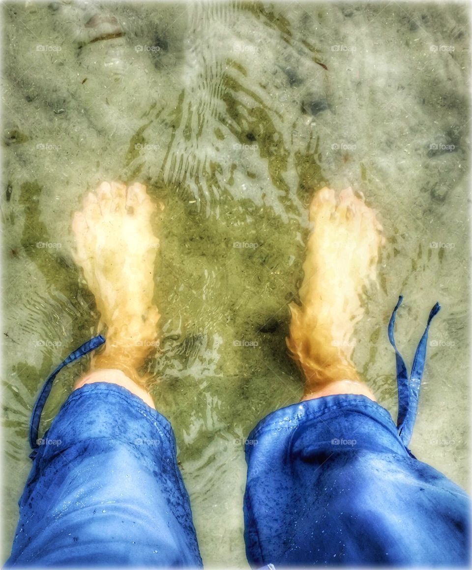 Wading in the ocean at low tide