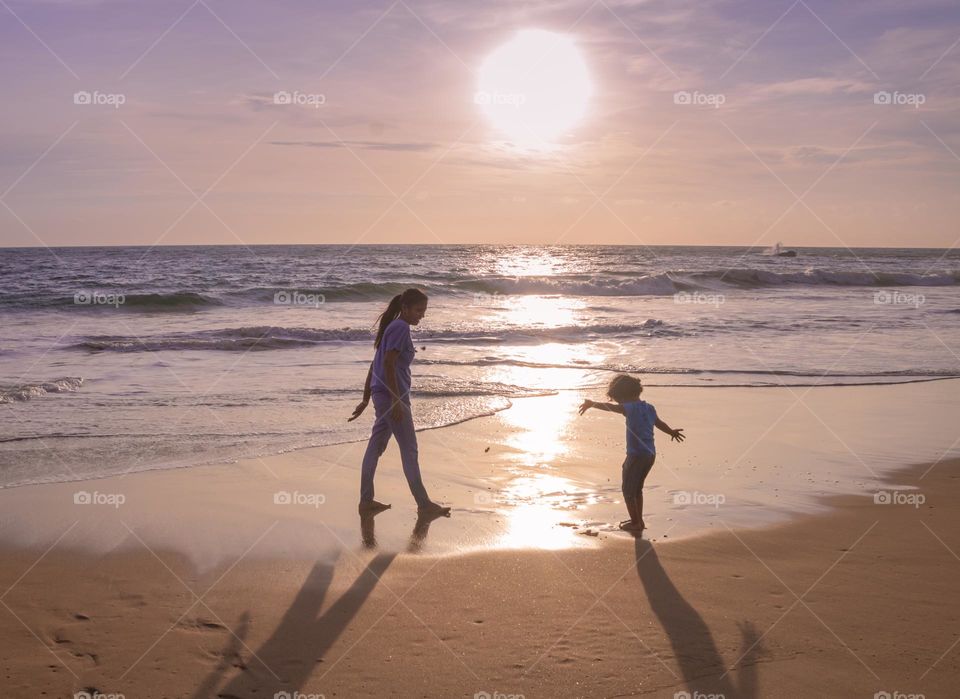 Enjoying at beach before sunset with beautiful reflection and shadows,