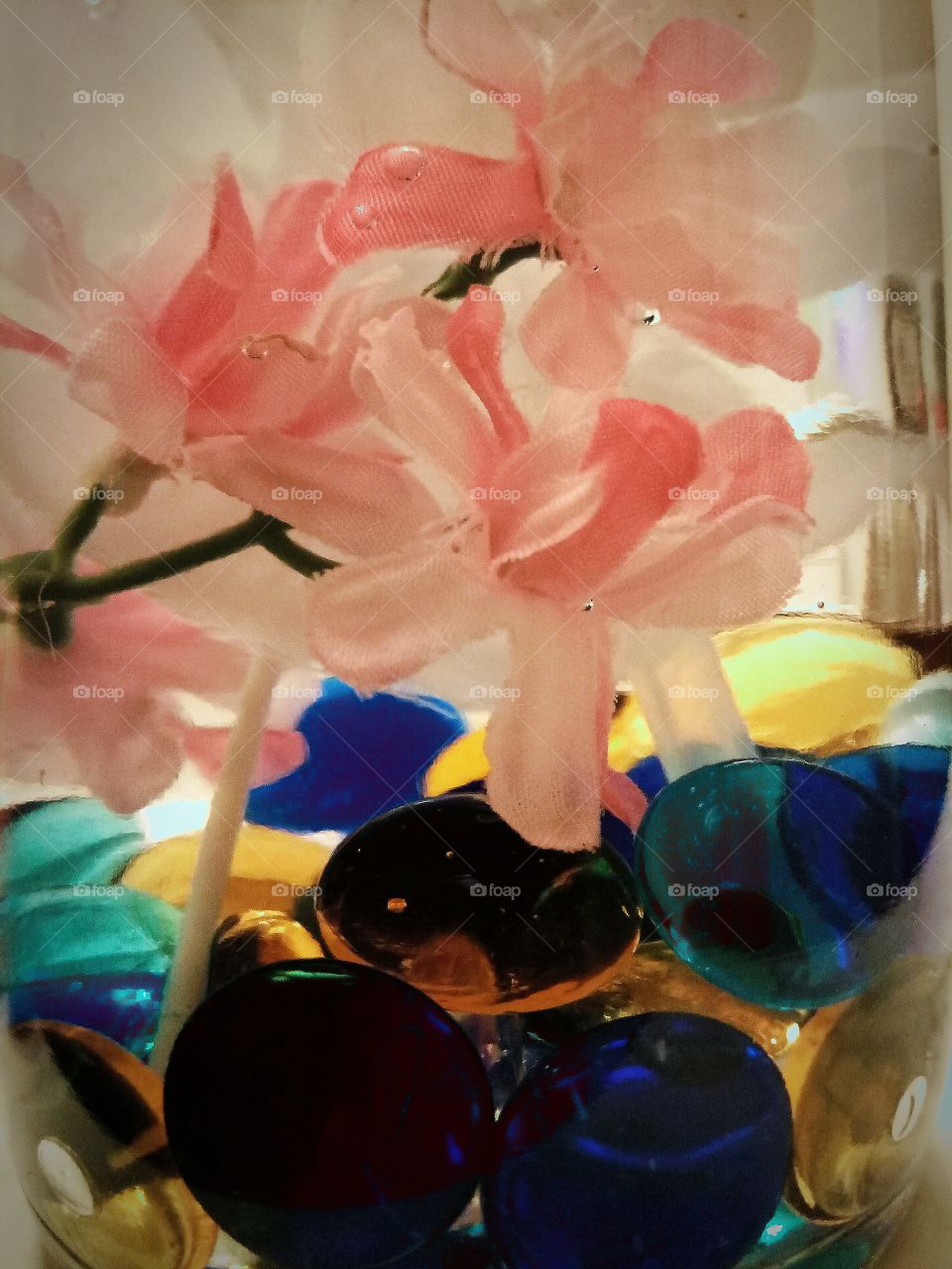 Flowers and Glass Stones in a Liquid Hand Soap Bottle