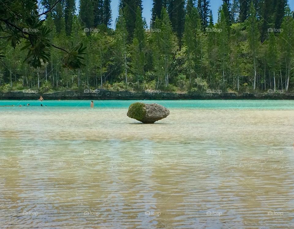 
Rock in the middle of the most beautiful pacific lagoon