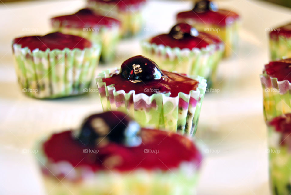 Mini cup cheesecakes with blueberry on top