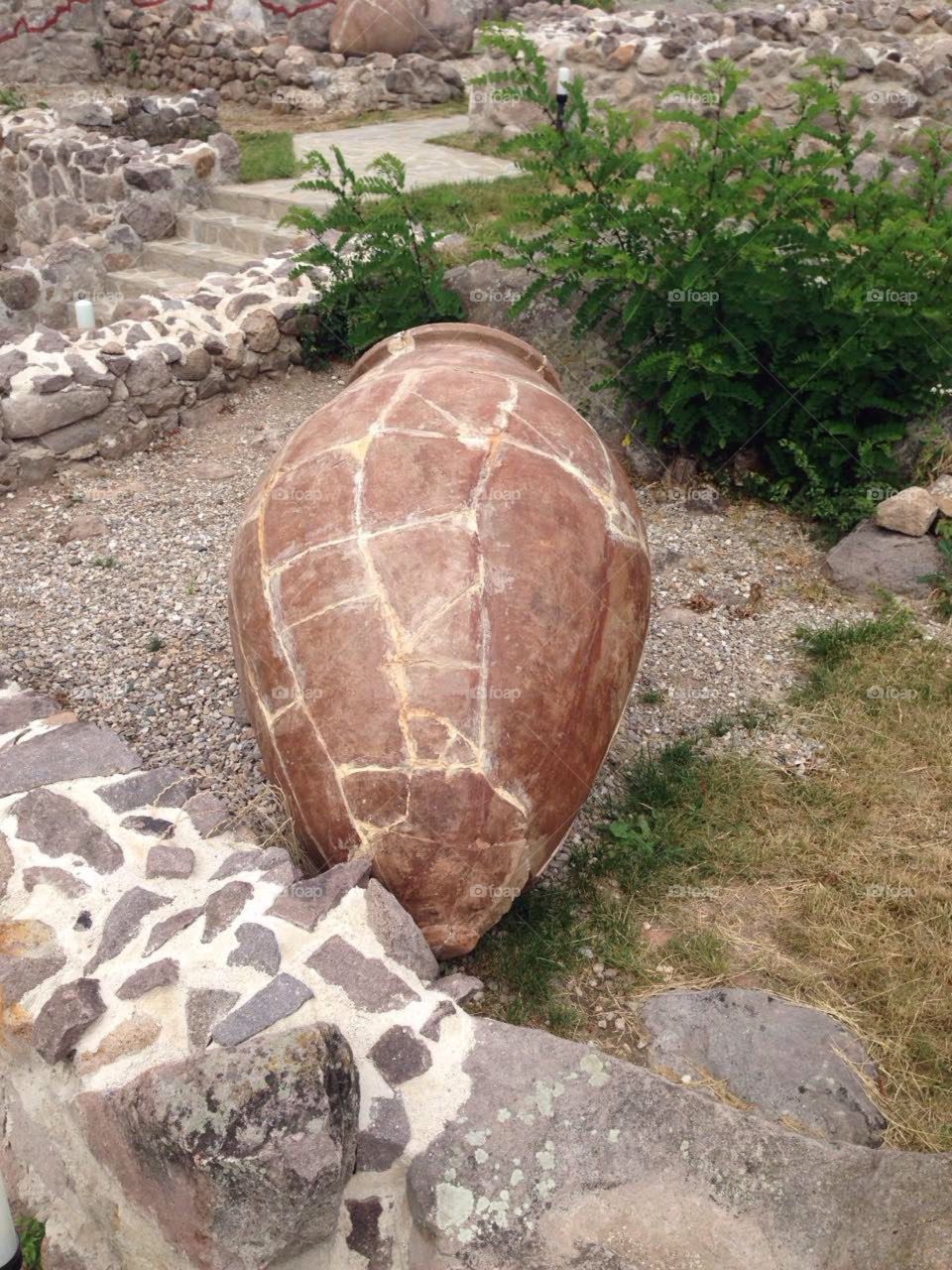Clay jar and artifacts in Peristera fortress  in Bulgaria - Ancient and Medieval archaeological monument in Peshtera, Bulgaria.