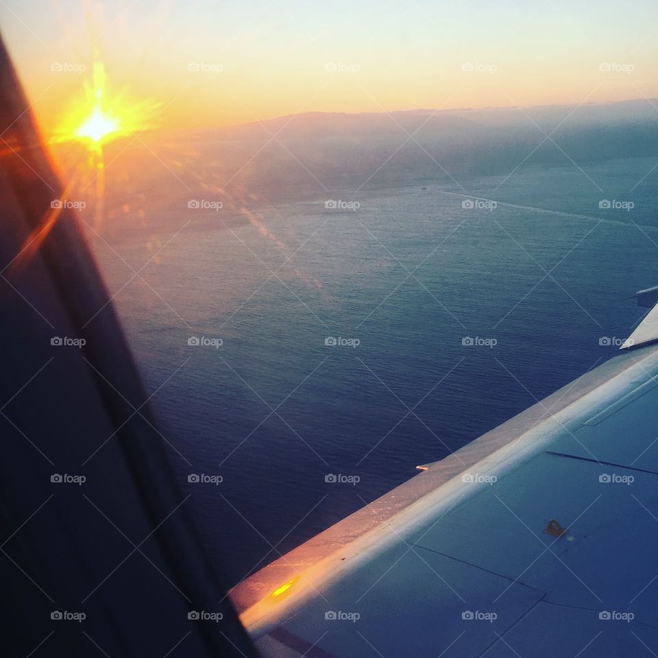 Fly to the sun view from a plane