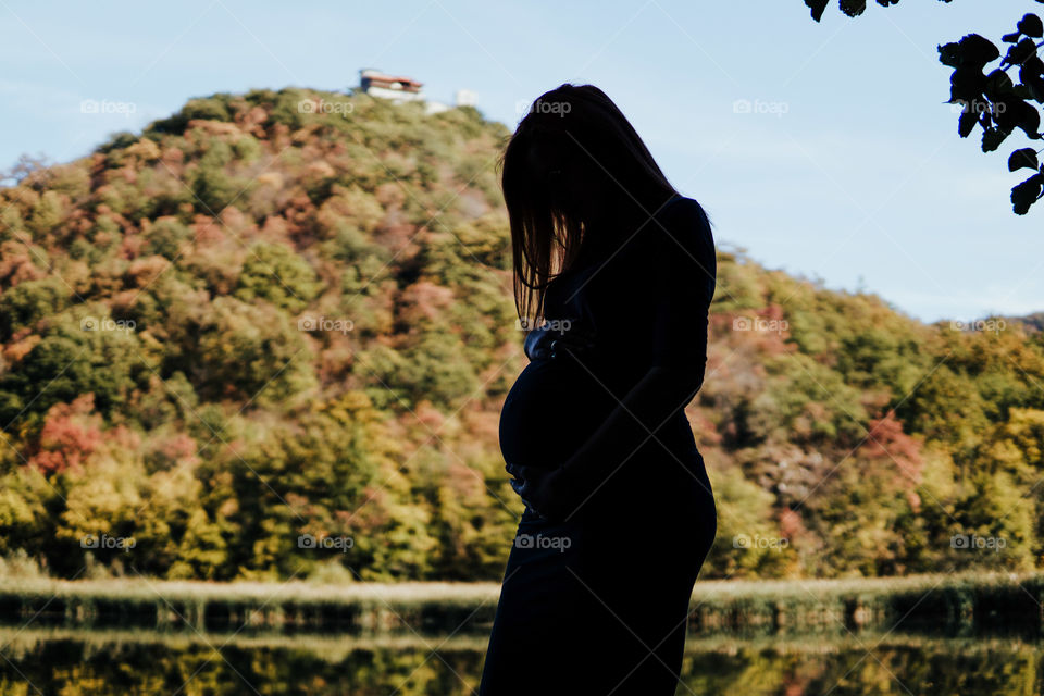 Siluethe of a pregnant wife