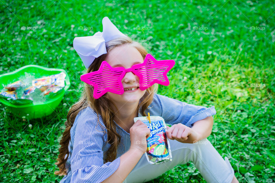 Young Girl with Funny Glasses Drinking Kool Aid Jammers 2