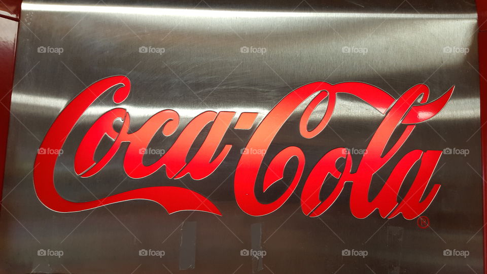 Coca-Cola sign, antique vending machine